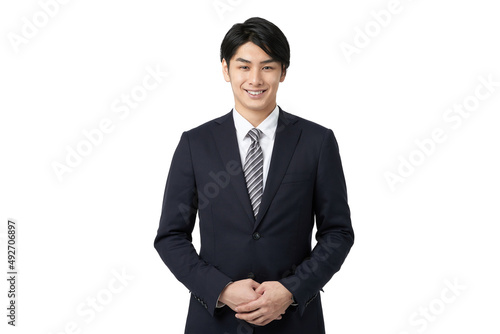 笑顔で挨拶をするアジア人ビジネスマン Fototapet