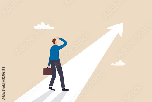 Finding purpose, objective and motivation to achieve goal, existential crisis to discover life meaning, challenge to define business target concept, confused businessman aiming at future purpose arrow photo