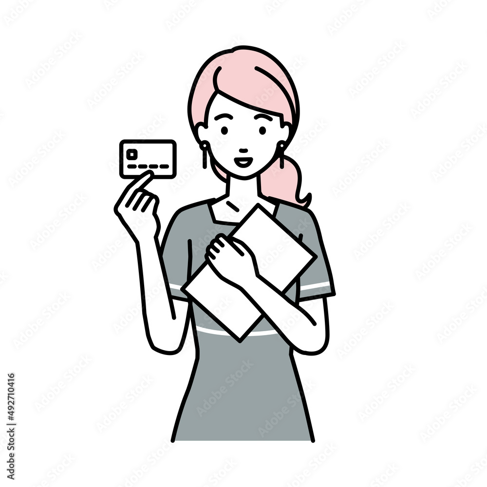 立って書類とカードを手に持つエステ店員・接客・受付の女性