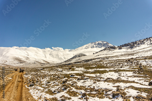 Scenic view of Kızlarsivrisi mountain, 3070 meter high, which is very popular for mountaineering, Elmalı, Antalya photo