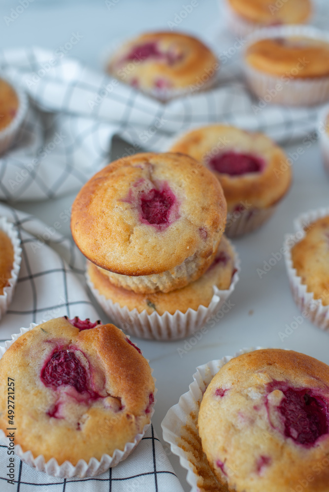 sweet vanilla raspberry muffins on a table