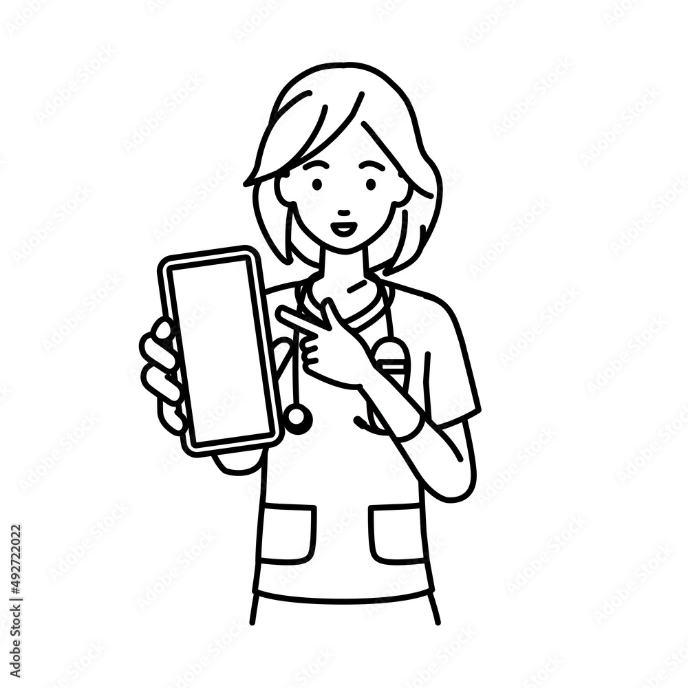 立ってスマートフォンを指差してこちらに向けて見せている看護師の女性 立ってスマートフォンを指差してこちらに向けて見せている看護師の女性