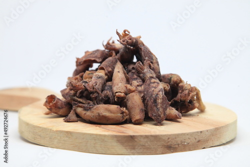 Dried squids on a wooden tray