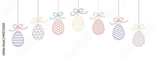 Design of a banner with hanging Easter eggs. Vector
