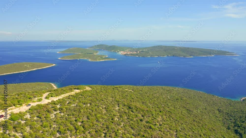 Incredible view of small Ilovik island from Losinj island. Filmed in UHD 4k video. Incredible view of small Ilovik island from Losinj island. Filmed in UHD 4k video.