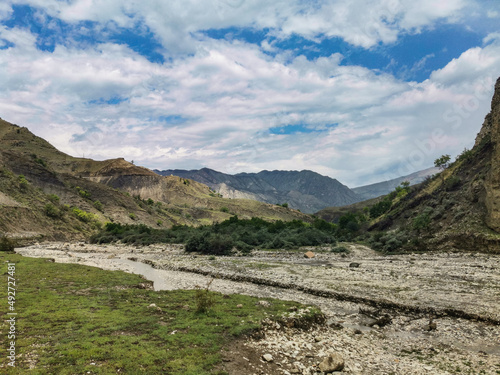The river near the Saltinsky waterfall. Russia Dagestan June 2021.