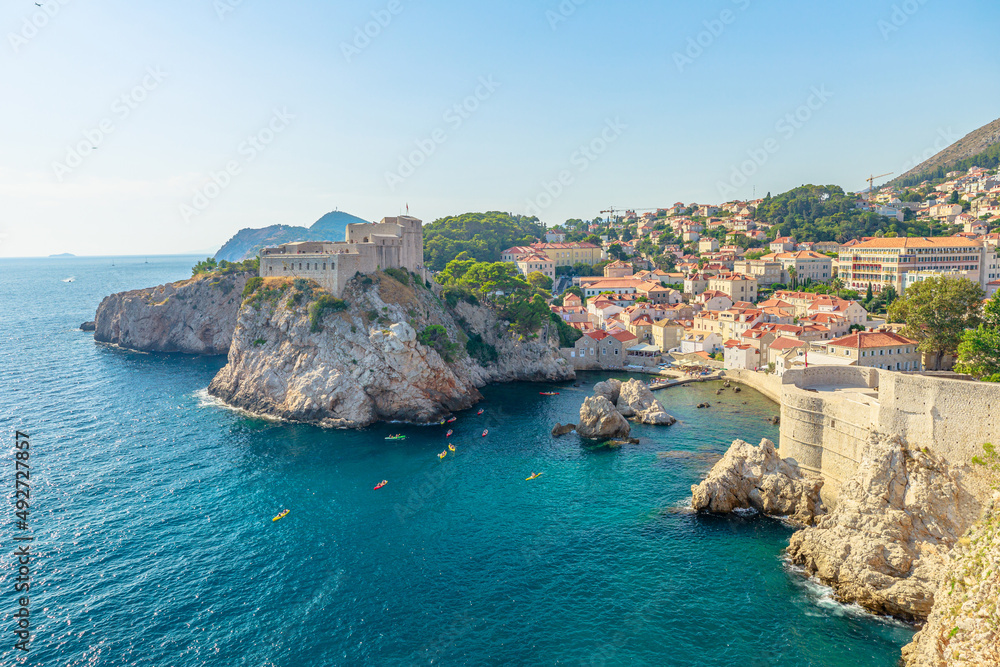 view from top walls of Dubrovnik city of Croatia. Looking Fort Lovrijenac fortress, over the West Harbour. Dubrovnik historic city of Croatia in Dalmatia. UNESCO World Heritage Site.