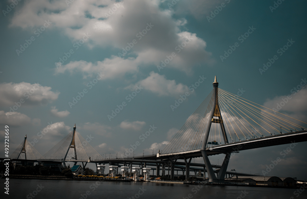 Bangkok, thailand - 12 Mar, 2021 : Bhumibol suspension bridge cross over Chao Phraya River at afternoon. Is one of the most beautiful bridges in Thailand. No focus, specifically.