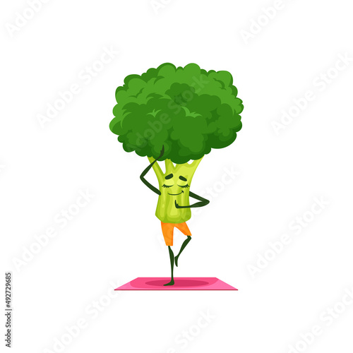 Sportive healthy broccoli cartoon character with face, hands and legs standing on fitness pilates mat isolated. Vector vegetarian food with happy smile, nutrition veggie on fitness workout, vitamin
