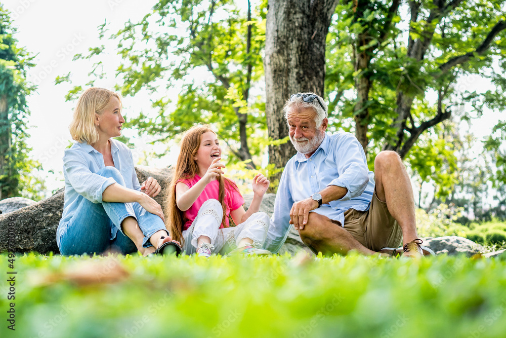 Happy family parent and child relax in weekend holiday lifestyle park outdoor nature background. Happy family parent and child relax in weekend holiday lifestyle park outdoor nature background.