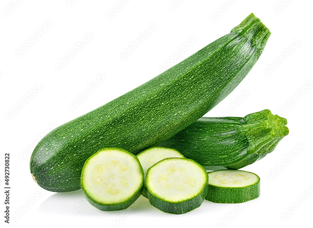 fresh green zucchini with slice isolated on white background. fresh green zucchini with slice isolated on white background.