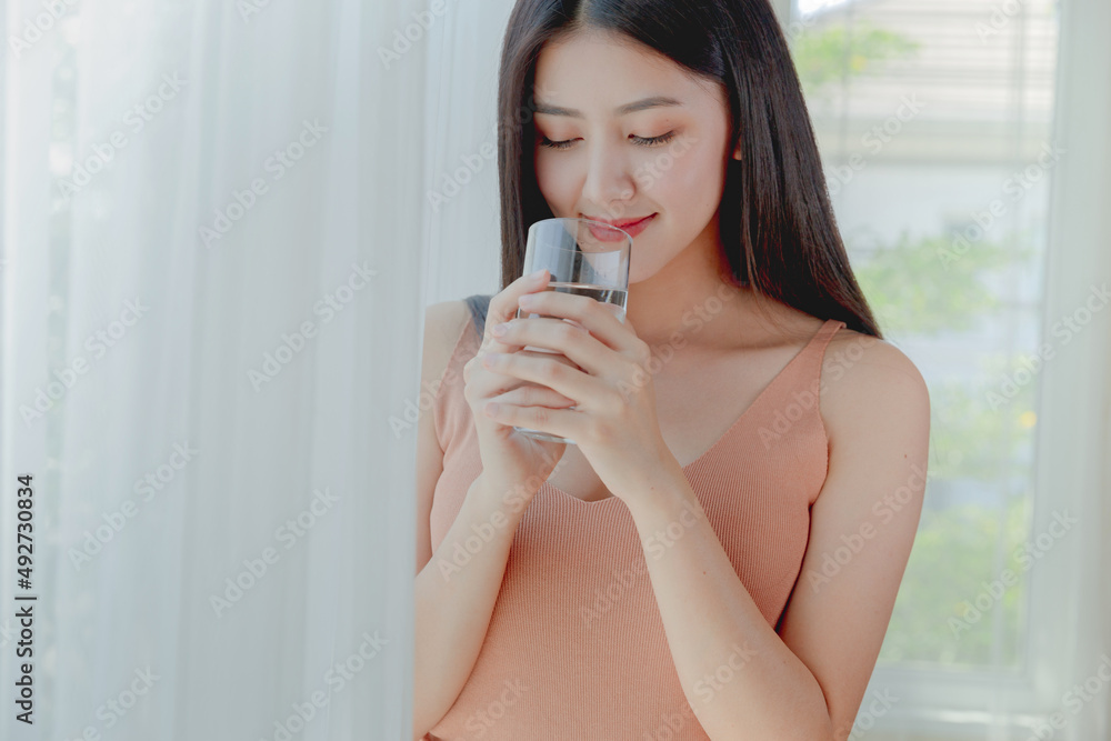 asian woman healthy drinking fresh water of glass , Beauty healthcare diet and drinks lifestyle concept. asian woman healthy drinking fresh water of glass , Beauty healthcare diet and drinks lifestyle concept.