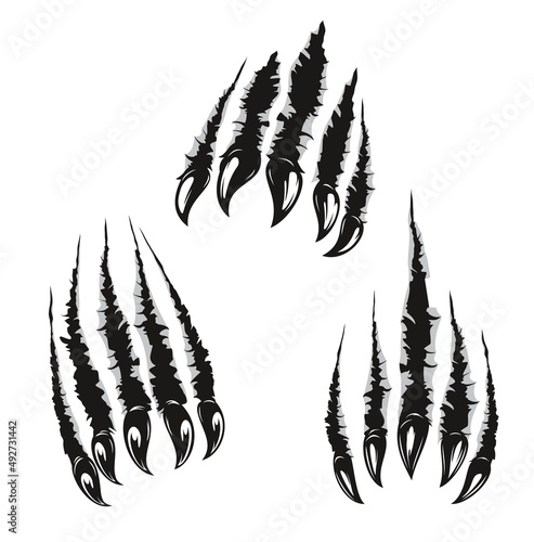 Angry bear claw marks and scratches of wild animal paws attack. Vector bear monster slash traces or grizzly beast torn tracks with scary nails, talons and ripped holes on white background photo