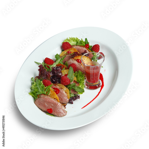 traditional dishes of European cuisine, delicacy, banquet snack. culinary dishes on a white plate on a white background. restaurant service photo