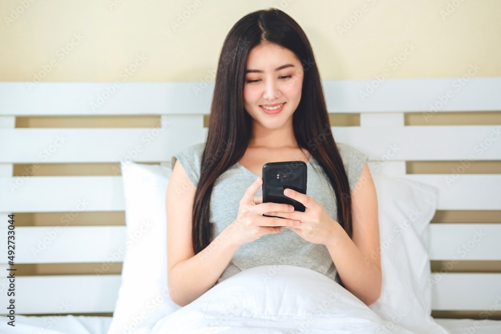 Portrait asian woman using smartphone work from home, Technology communication lifestyles concept. Portrait asian woman using smartphone work from home, Technology communication lifestyles concept.