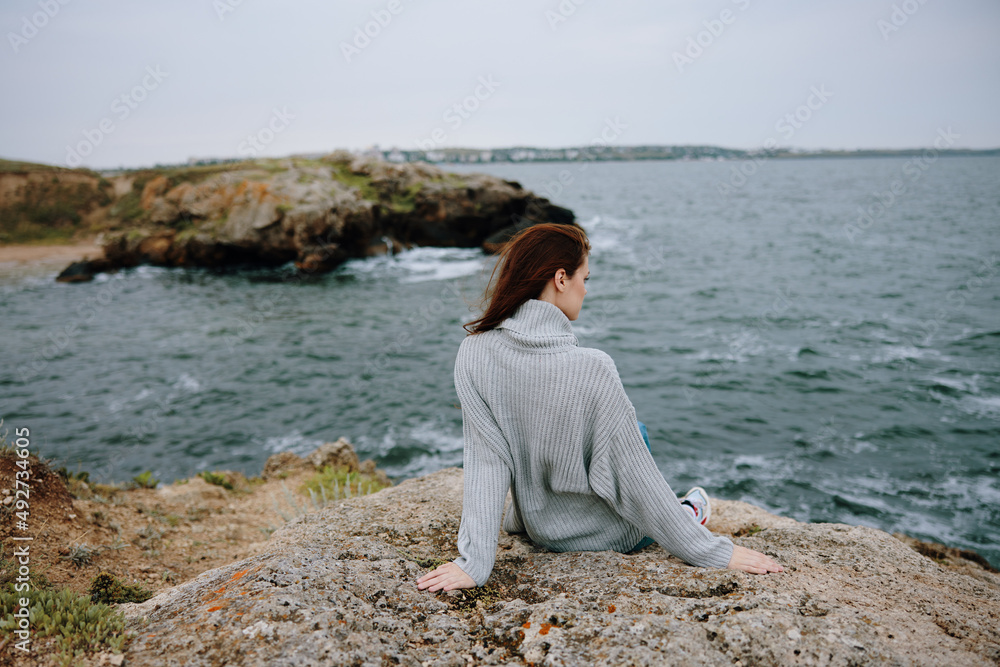 beautiful woman sweaters cloudy sea admiring nature Lifestyle