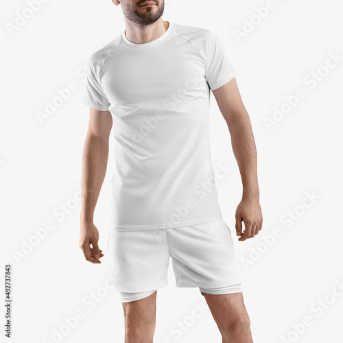 White tracksuit mockup, loose shorts with underpants compression line, t-shirt on man, isolated on background, front view.