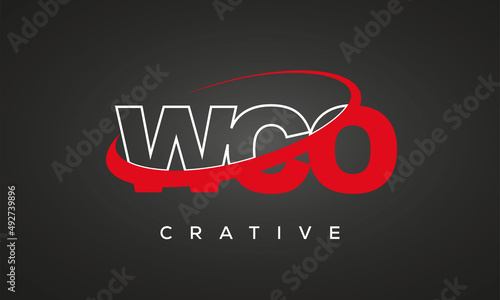 WCO creative letters logo with 360 symbol vector art template design photo