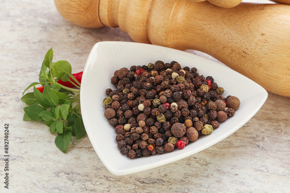Peppercorn mix heap in the bowl Peppercorn mix heap in the bowl
