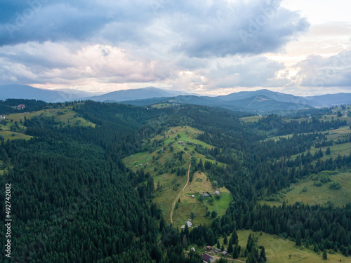 Fototapeta Naklejka Na Ścianę i Meble -  Green Ukrainian Carpathians mountains in summer. Aerial drone view.