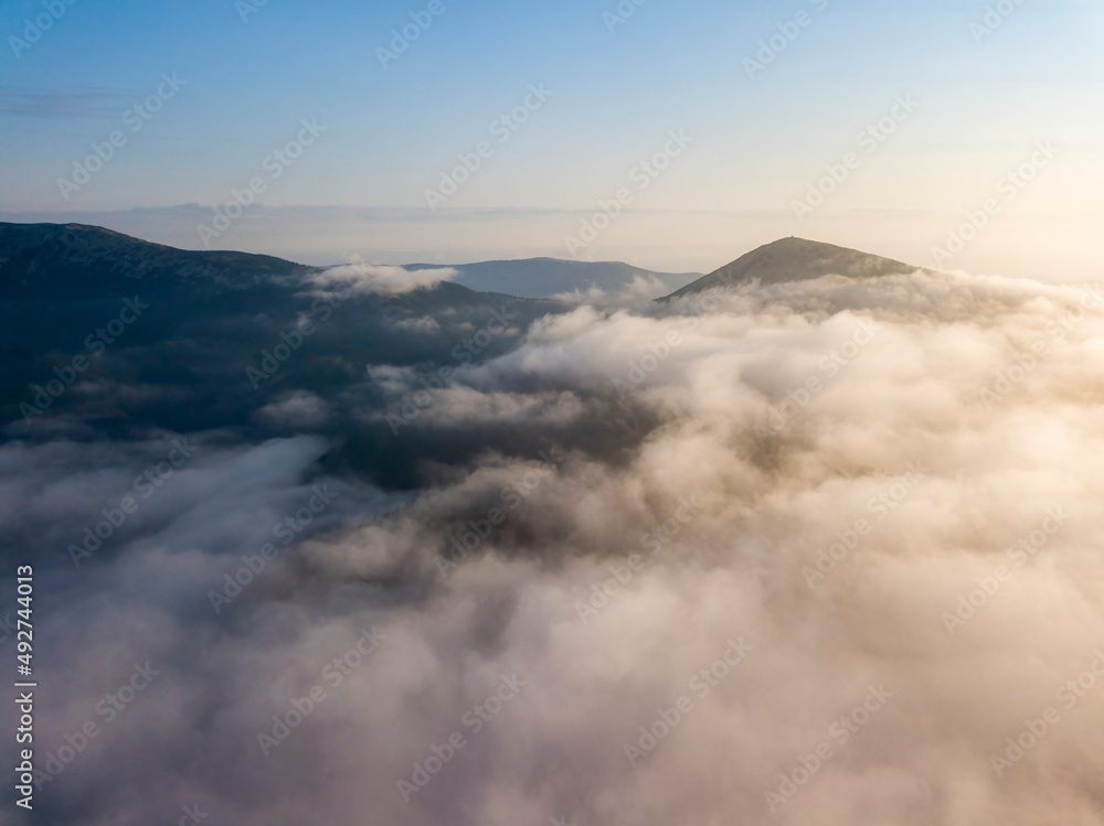 Obraz premium Morning fog in the Ukrainian Carpathians. Aerial drone view.