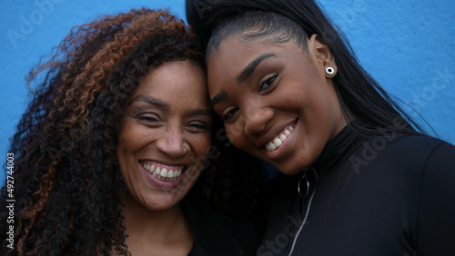 Daughter hugging mother a Brazilian family love