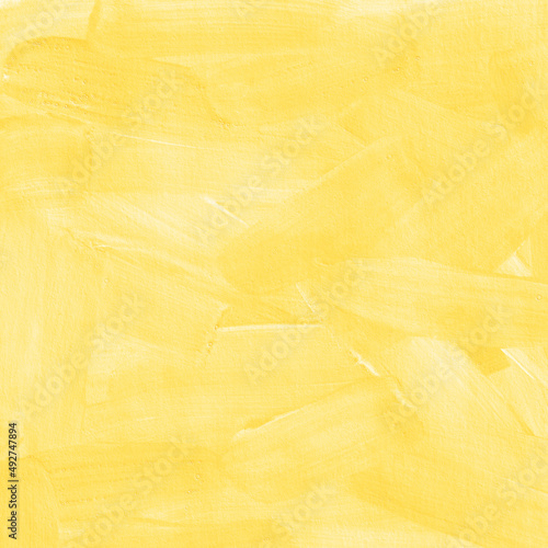 Yellow paint brush texture. Sunny background