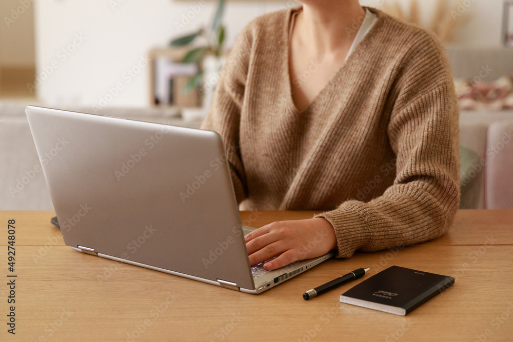 Fototapeta premium woman working on laptop