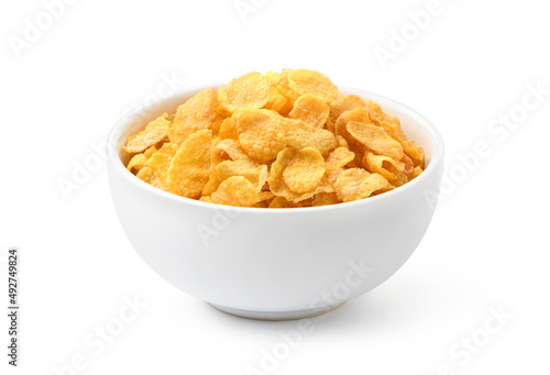 Crispy corn flakes in white bowl isolated on white background. Clipping path.