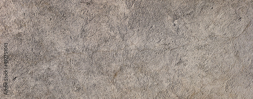 Fototapeta Abstrakcyjne tło porysowanej tekstury postarzanej ściany muru ogrodowego. Tapeta.