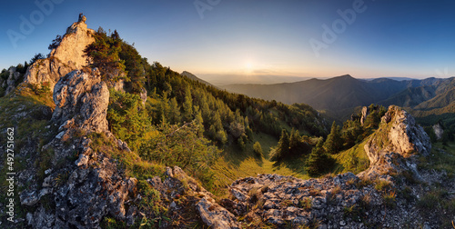 Forest and rocks mountain with sun at beautifull sunset - panorama, Slovakia