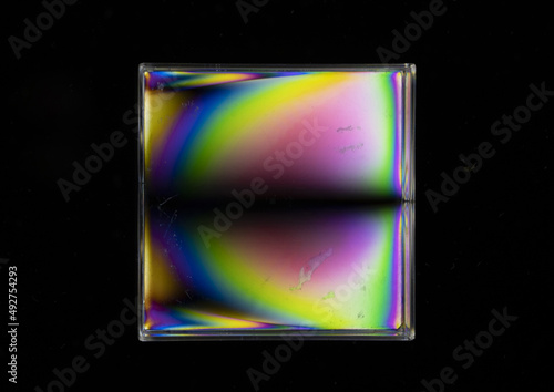 Iridescent colors, polarized light, interference