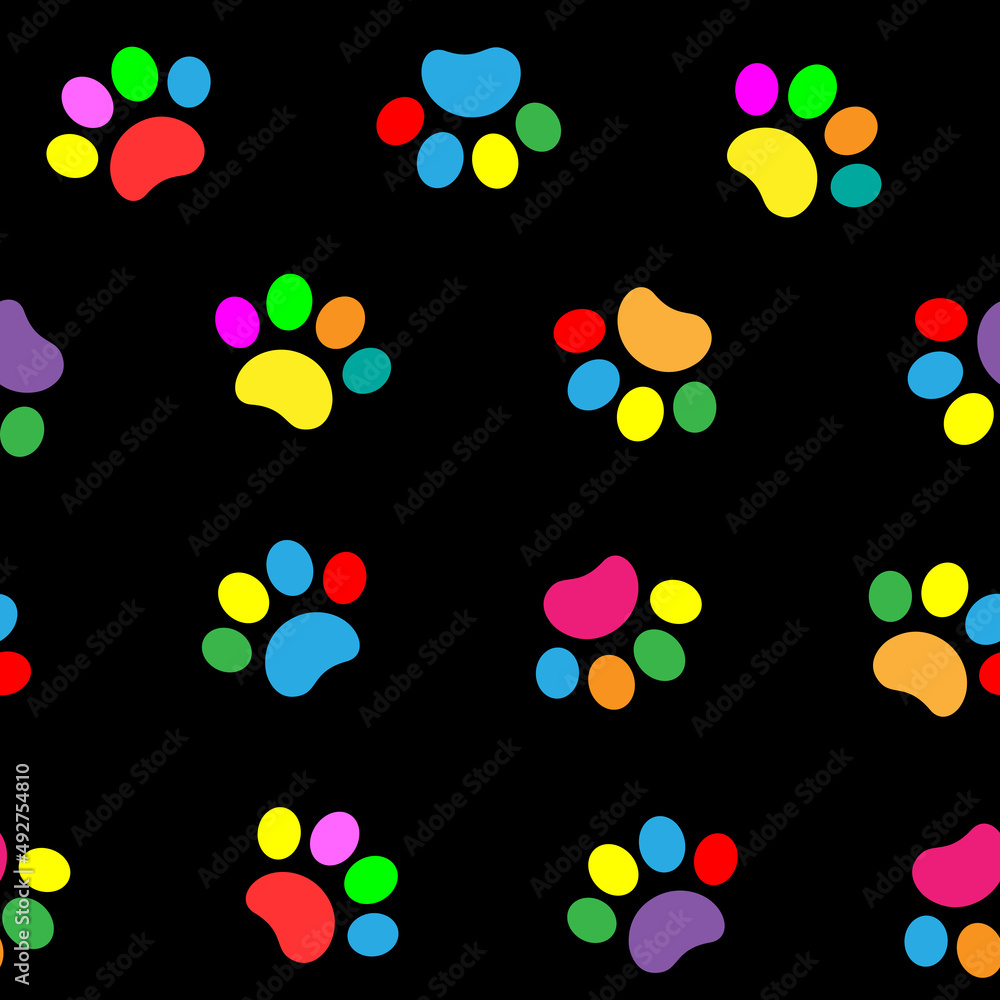 Colorful cartoon paw prints on a black background seamless pattern.