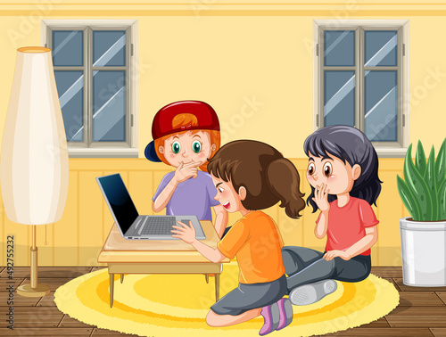 Happy kids playing computer at home