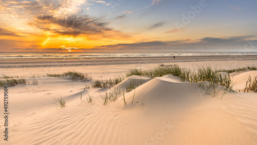 Fototapeta Naklejka Na Ścianę i Meble -  Beach and dunes colorful sunset