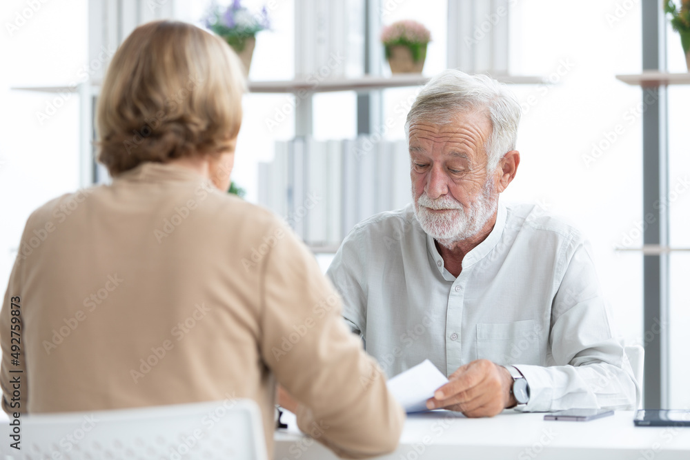 senior businessman or employer asking and talking about works to coworker senior businessman or employer asking and talking about works to coworker