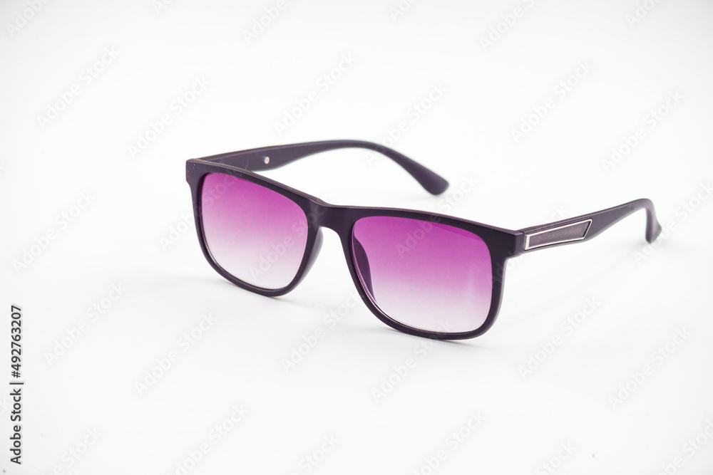 Fashionable sunglasses for women. burgundy glass. beautiful shape. Women's accessory.on a white isolated background.