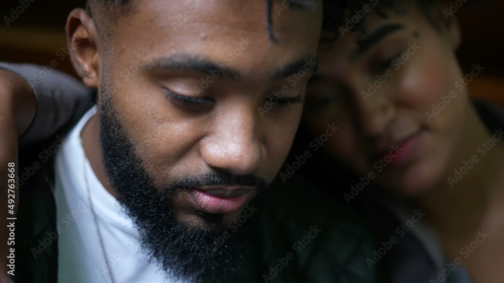 An African couple faces hypnotized by online content An African couple faces hypnotized by online content