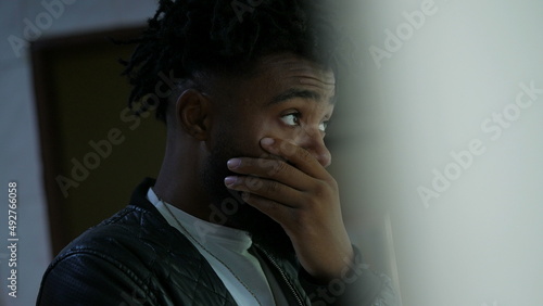 Quadro em tela A pensive black man thinking a thoughtful African person contemplating dilemma