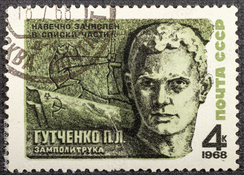 USSR - CIRCA 1968: A stamp printed in the USSR devoted ever enrolled in the lists of the military unit deputy political instructor Gutchenko P., circa 1968