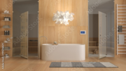 Blur background, minimalist wooden spa room, bathroom, wellness center with bathtub, sauna room with glass doors, rack, towels, shelves, carpet, pendant lamp. Interior design concept