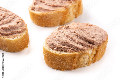 Toasted bread with pork liver pate isolated on white background 
