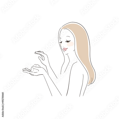 シャンプーを手で泡立てる美しい女性