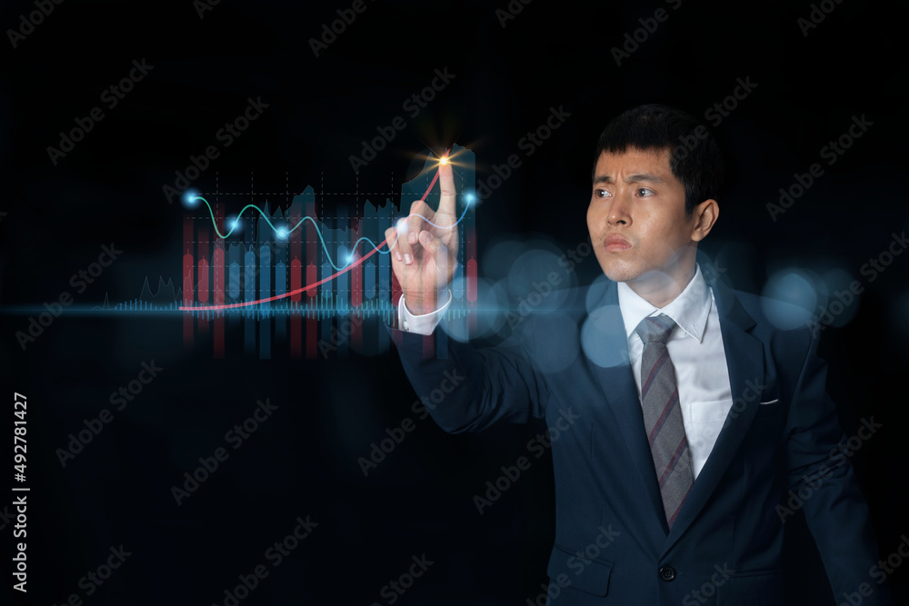 Businessman showing growing virtual hologram stock, invest in trading. Businessman showing growing virtual hologram stock, invest in trading.