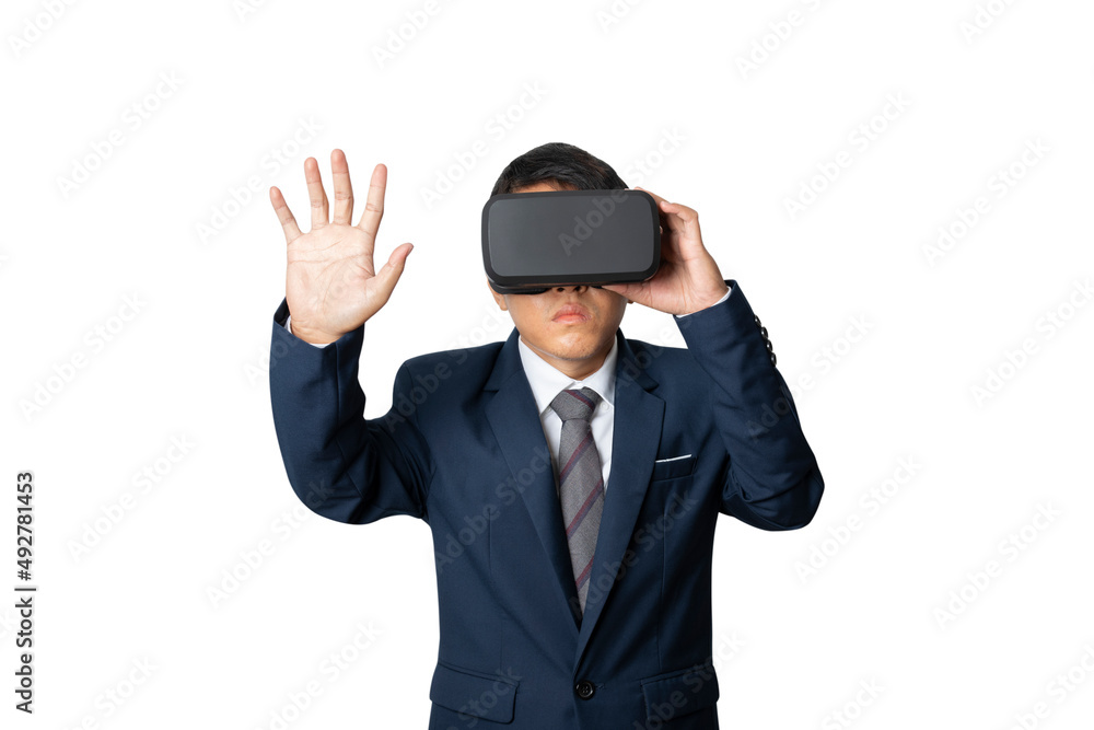 Studio portrait businessman wearing VR Headset touching something isolated on gray background. Studio portrait businessman wearing VR Headset touching something isolated on gray background.