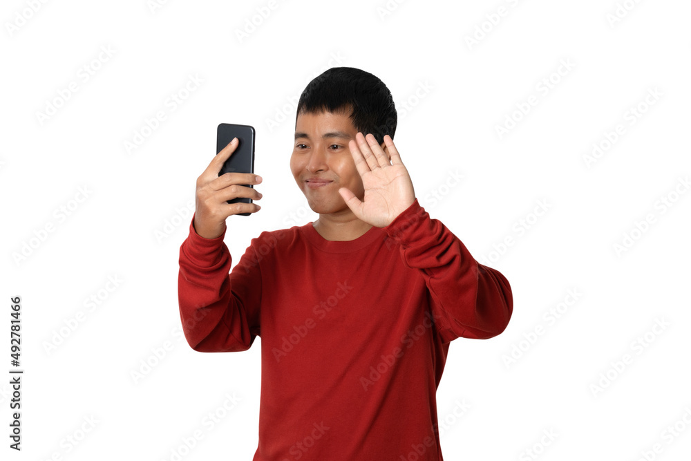Young man having video-call with holding smart phone in hand shooting selfie.