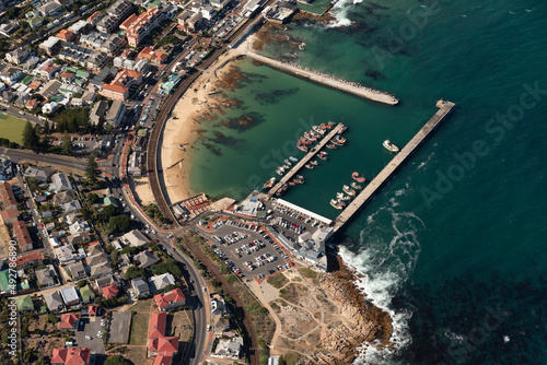 Kalk Bay, Cape Town, South Africa. 2022. Aerial view of the fishing harbour at Kalk Bay waterfront. photo