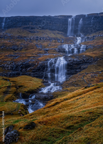 Europe, Faroe Islands. View of the village of Saksun and waterfalls on the island of Streymoy. November 2021