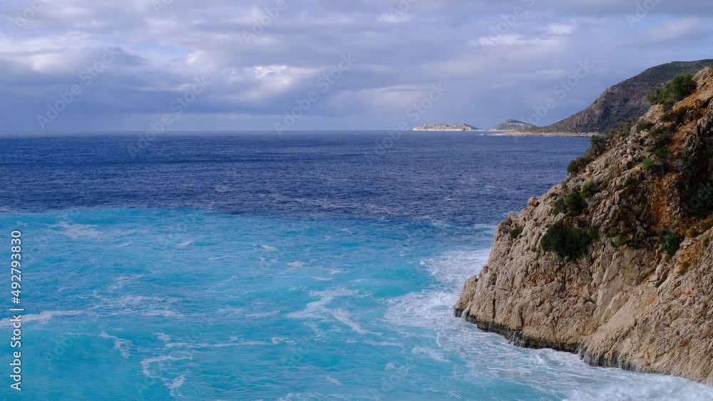 Empty famous Kaputas beach in winter in bay of Antalya, Turkey. Sandy beach and clear turquoise waters in Mediterranean Sea. nature of Turkey. Empty famous Kaputas beach in winter in bay of Antalya, Turkey. Sandy beach and clear turquoise waters in Mediterranean Sea. nature of Turkey.