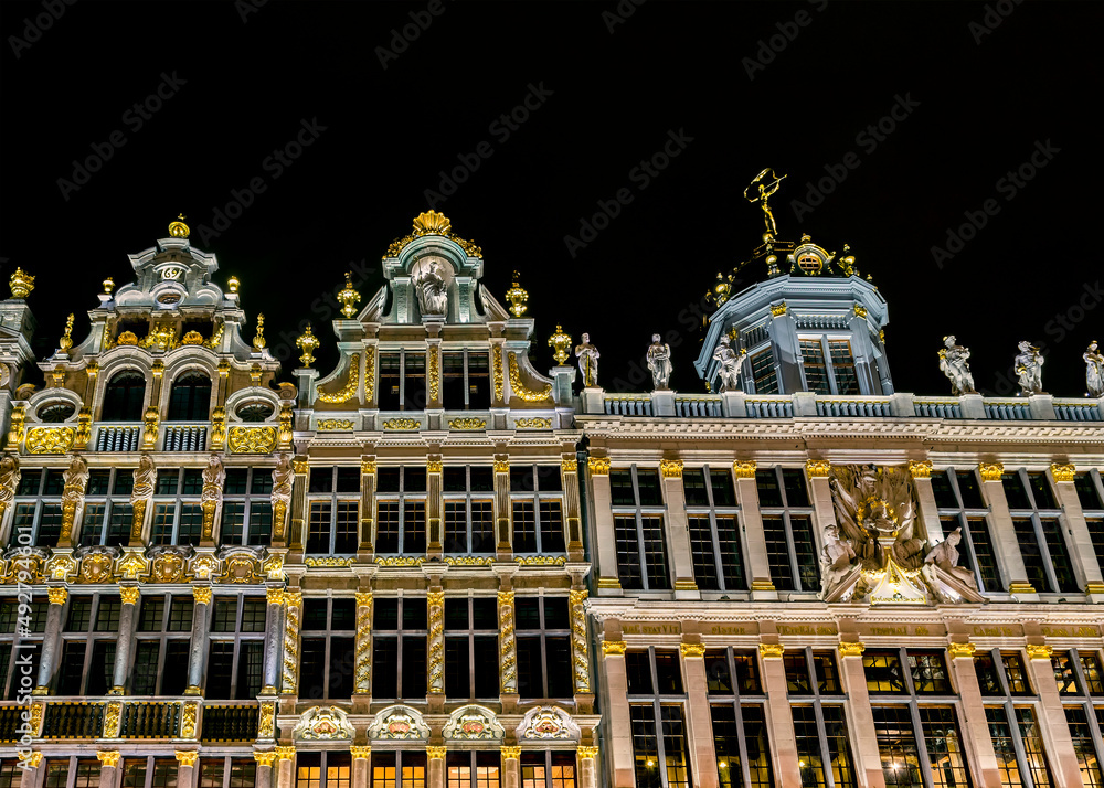Grand Place buildings at night, Brussels, Belgium. Grand Place is the central square of Brussels capital city, surrounded by opulent guildhalls	